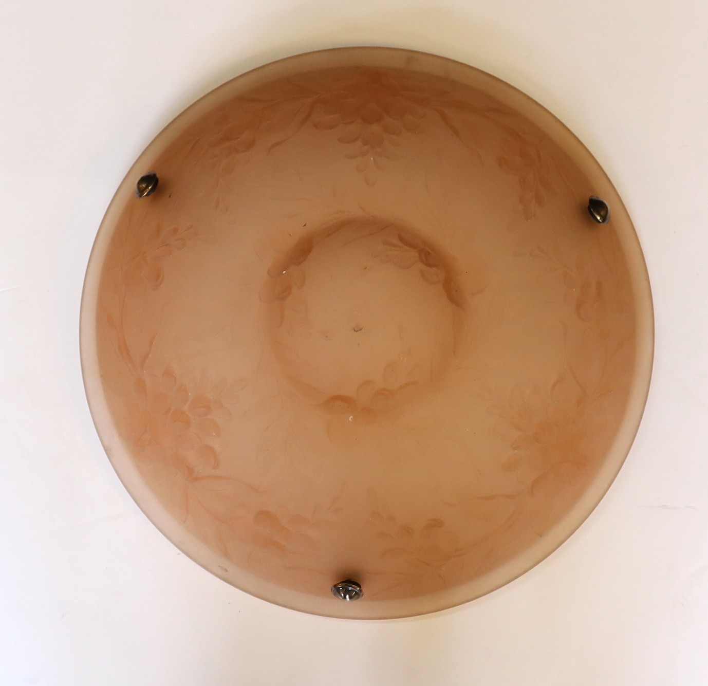 A 1920s – 30s French peach glass light bowl moulded with trailing flowers, with chain set and ceiling rose, diameter 35cm
